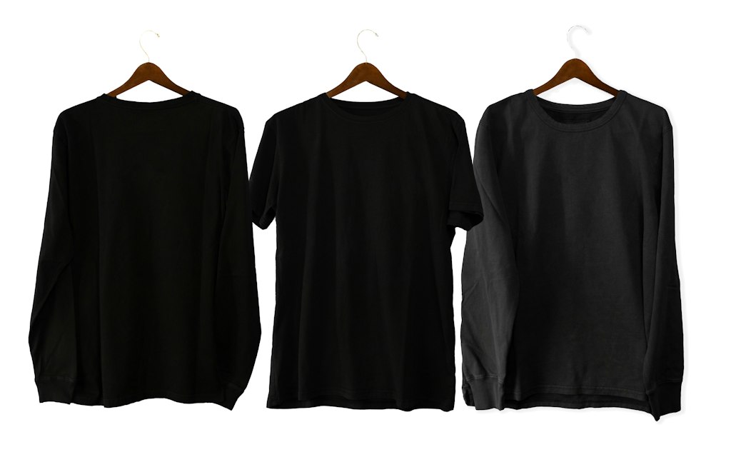Blank plain t-shirts on hangers, ready for custom team printing